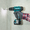 Аккумуляторная ударная дрель-шуруповерт MAKITA HP 332 DWAX1 в чем. + набор бит